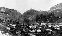 Rail Tracks Parallel Residences in Mining Towns