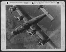 Limping Home - B-24 with Feathered/Smoking Engines