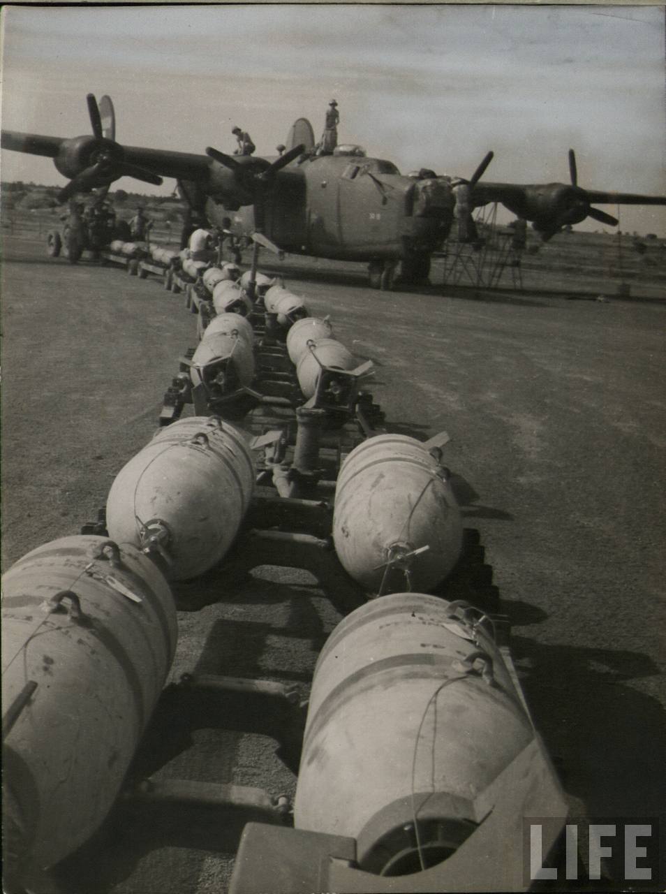 Loading Bombs On A B-24