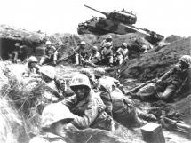 Iwo Jima - Weary Troops Rest Behind Tanks