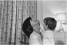 JFK, Jr. Playing with Mother's Pearls
