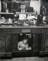 John F. Kennedy, Jr. - Playing in the Resolute Desk