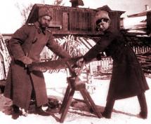 Photo: Nicholas II and Alexei Cutting Wood